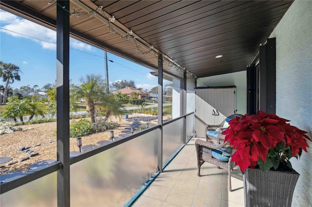 unfurnished sunroom featuring a healthy amount of sunlight