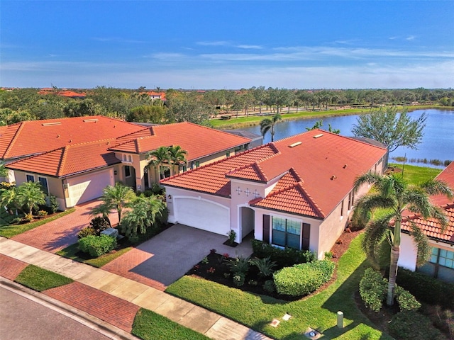 birds eye view of property featuring a water view