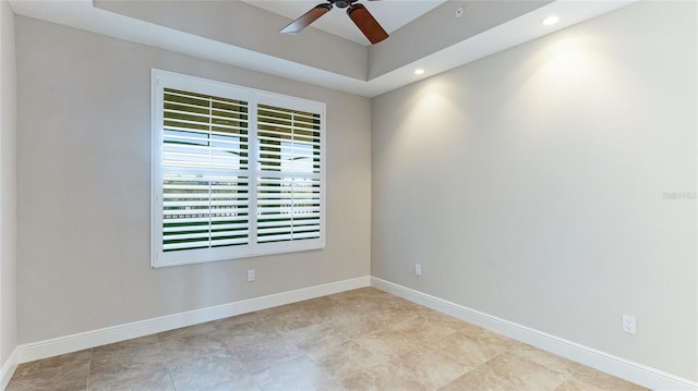 spare room featuring ceiling fan