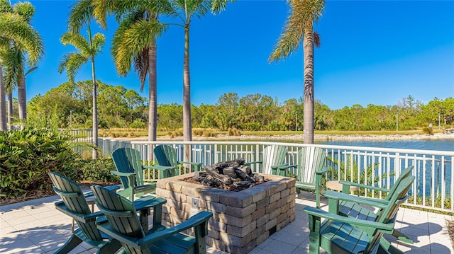 view of patio featuring an outdoor fire pit