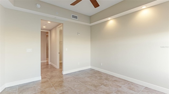 spare room featuring recessed lighting, a ceiling fan, a smoke detector, baseboards, and light tile patterned flooring