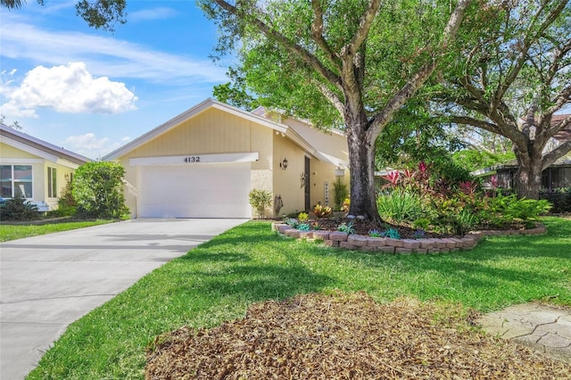 ranch-style house with a front yard and a garage