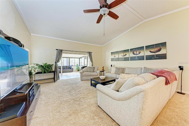 living room featuring ceiling fan, carpet floors, ornamental molding, and vaulted ceiling