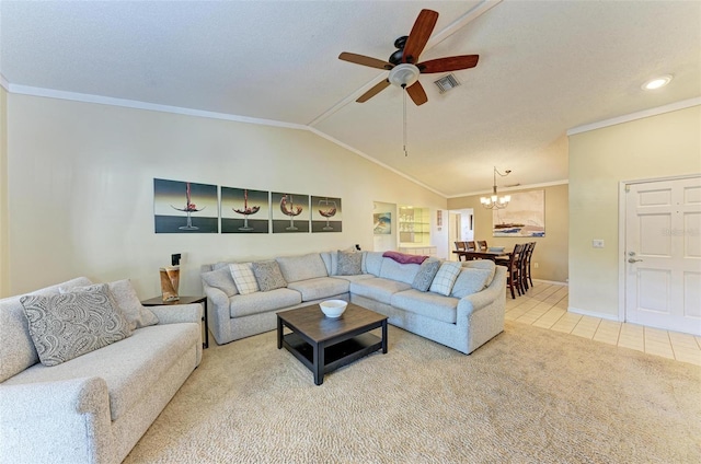 living room featuring ceiling fan with notable chandelier, carpet floors, ornamental molding, and vaulted ceiling