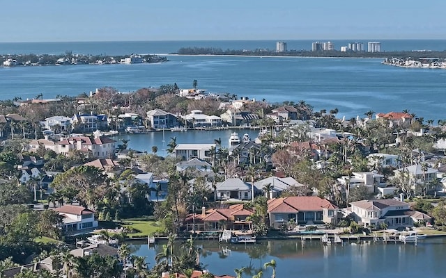 drone / aerial view featuring a water view