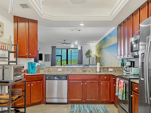 kitchen with kitchen peninsula, light stone counters, and appliances with stainless steel finishes