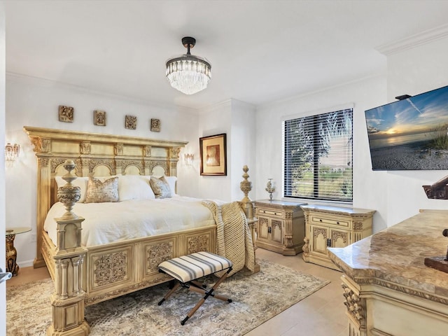 tiled bedroom with ornamental molding and an inviting chandelier