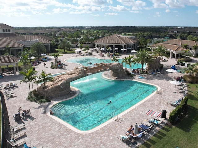 view of swimming pool featuring a gazebo and a patio