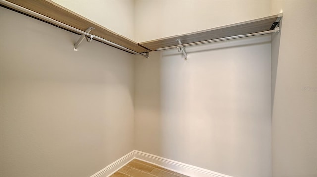 10142 Crystal Isles Cir, Sarasota, FL 34241 - spacious closet with light wood-type flooring