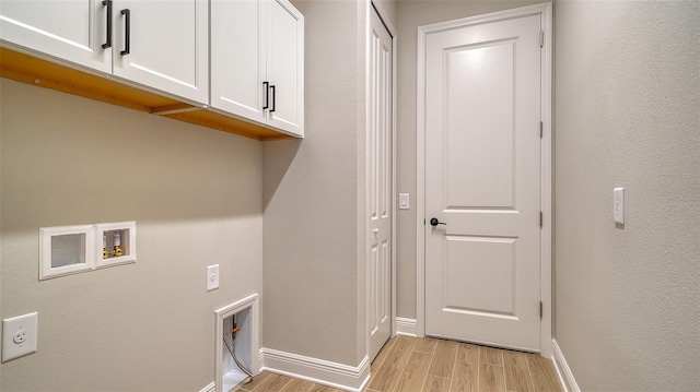 10142 Crystal Isles Cir, Sarasota, FL 34241 - washroom with cabinet space, hookup for a washing machine, electric dryer hookup, and light wood-type flooring