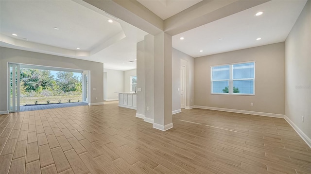 10142 Crystal Isles Cir, Sarasota, FL 34241 - empty room with light wood-type flooring and recessed lighting