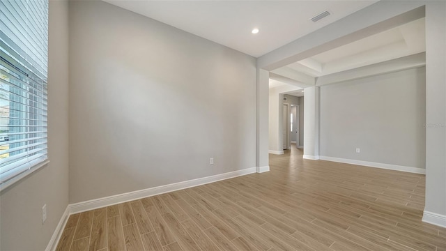 spare room with light wood-type flooring