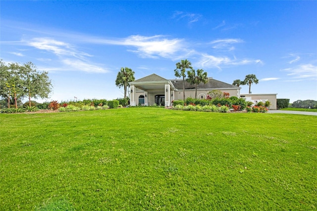 ranch-style house with a lanai and a front lawn