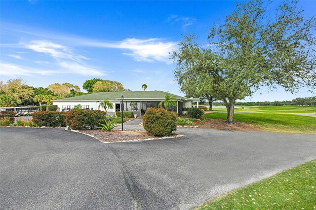 view of front of home featuring a front lawn