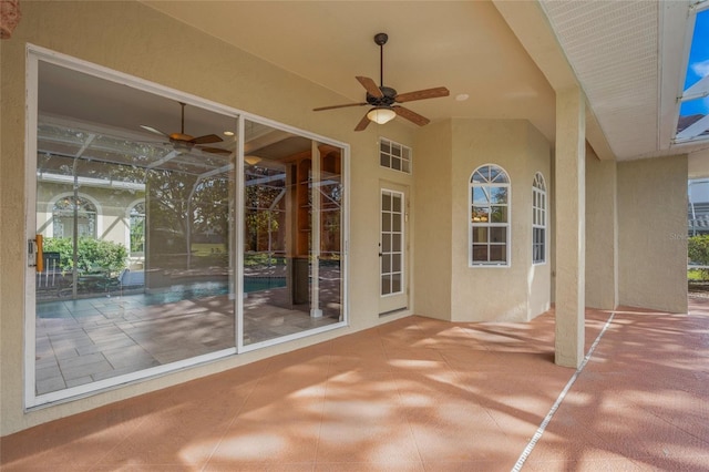 view of patio featuring ceiling fan