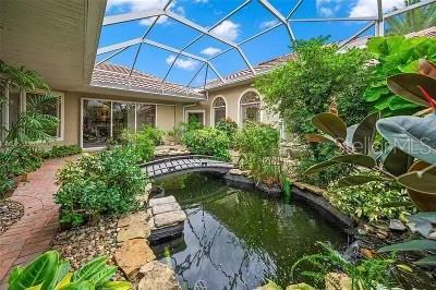 exterior space featuring a lanai and a pool