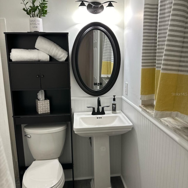 bathroom with toilet and sink