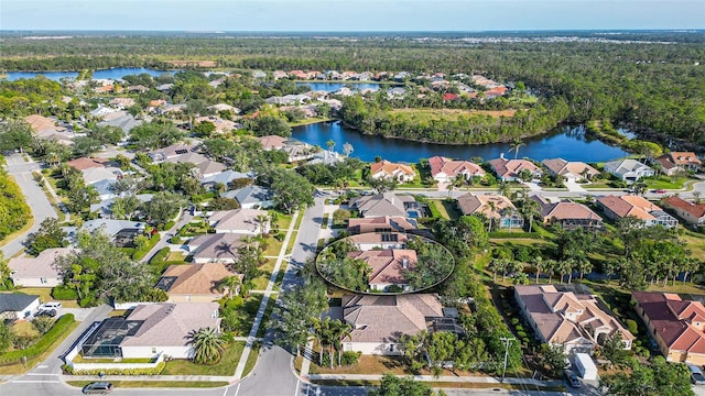 drone / aerial view featuring a water view