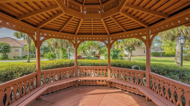 wooden terrace with a gazebo