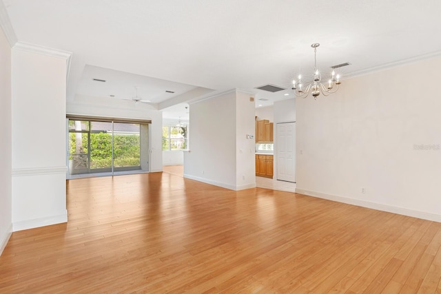 interior space with ceiling fan with notable chandelier, light hardwood / wood-style flooring, and ornamental molding