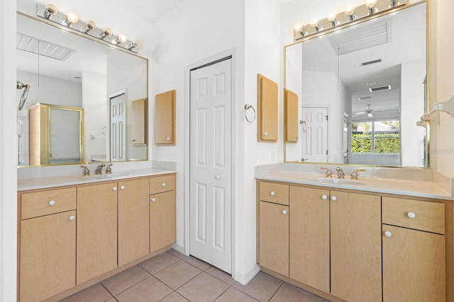 bathroom with vanity, tile patterned floors, and ceiling fan