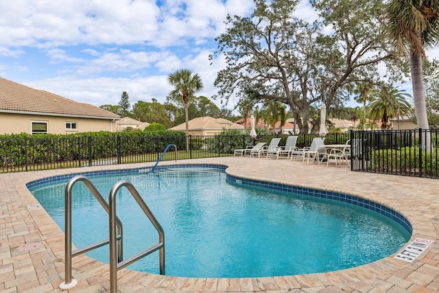 view of pool featuring a patio area