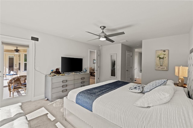 bedroom with ceiling fan, carpet, and baseboards