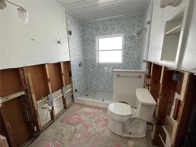 bathroom featuring walk in shower and toilet