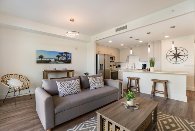 living room featuring dark hardwood / wood-style floors