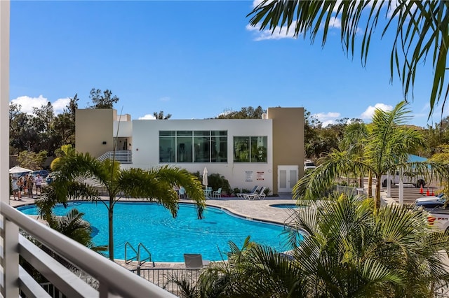 view of swimming pool with a patio area