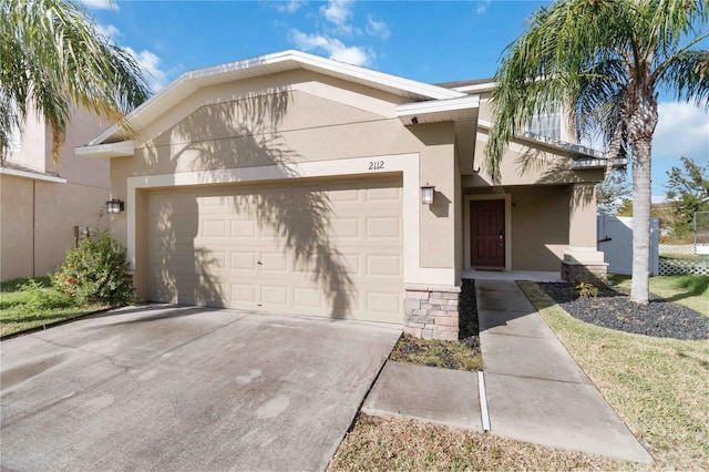 view of front of home with a garage