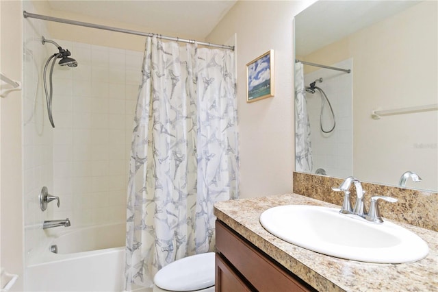 full bathroom featuring vanity, toilet, and shower / tub combo with curtain