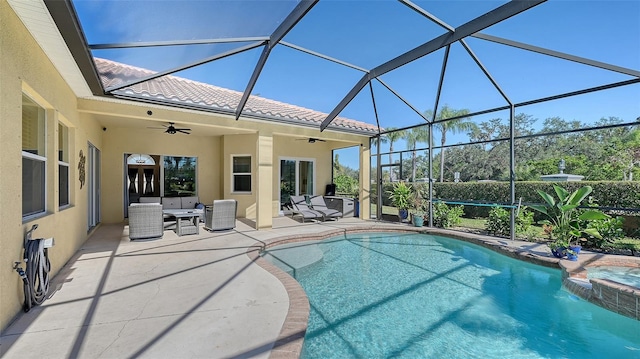 view of pool with cooling unit, an outdoor hangout area, ceiling fan, a lanai, and a patio