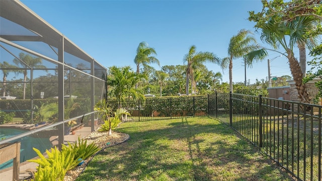 view of yard with a lanai