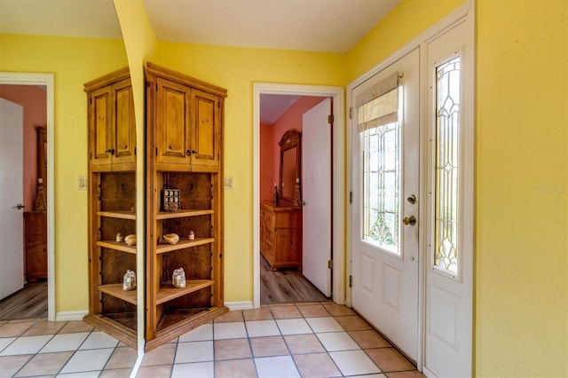 view of tiled foyer entrance