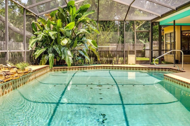 view of pool featuring a lanai