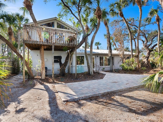 view of front of property with a deck