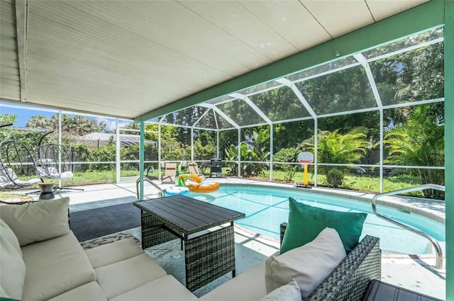 view of pool featuring outdoor lounge area and a patio