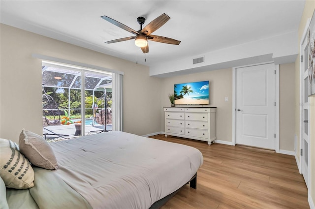 bedroom with access to exterior, light wood-type flooring, and ceiling fan