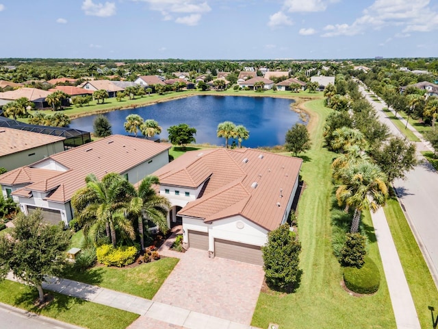 drone / aerial view with a water view