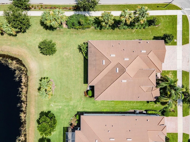 drone / aerial view with a water view