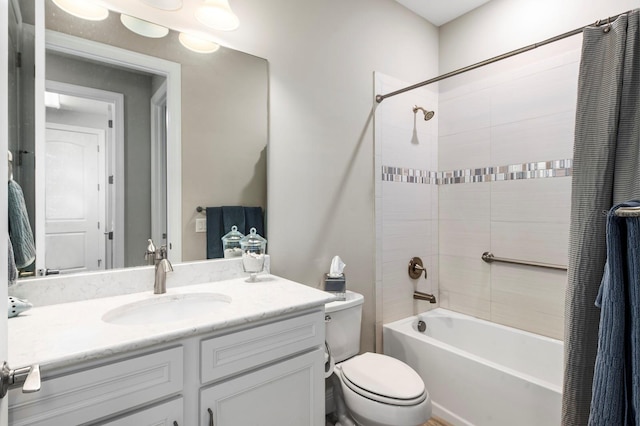 full bathroom featuring vanity, toilet, and shower / bathtub combination with curtain