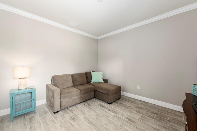 living room featuring light hardwood / wood-style flooring and ornamental molding