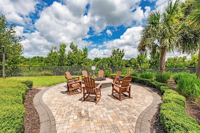 view of patio with an outdoor fire pit