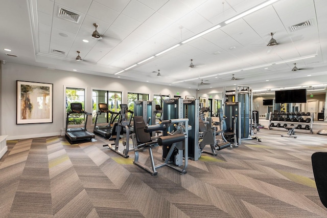 gym with carpet flooring and ceiling fan