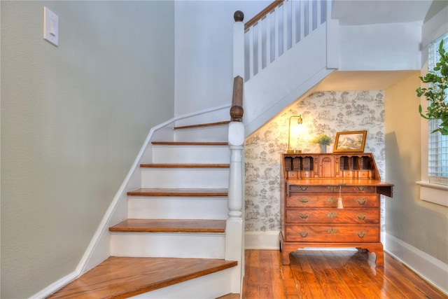 stairway with wood-type flooring