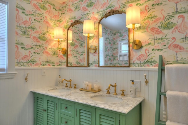 bathroom with vanity and a wealth of natural light