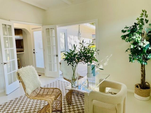 sitting room featuring french doors