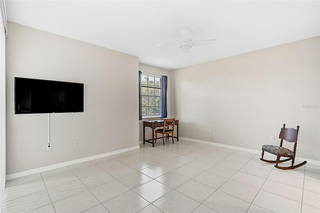 interior space featuring ceiling fan and light tile patterned floors