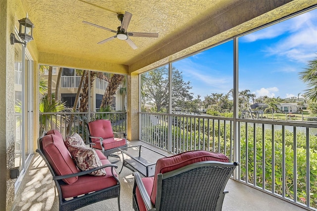 sunroom / solarium with ceiling fan